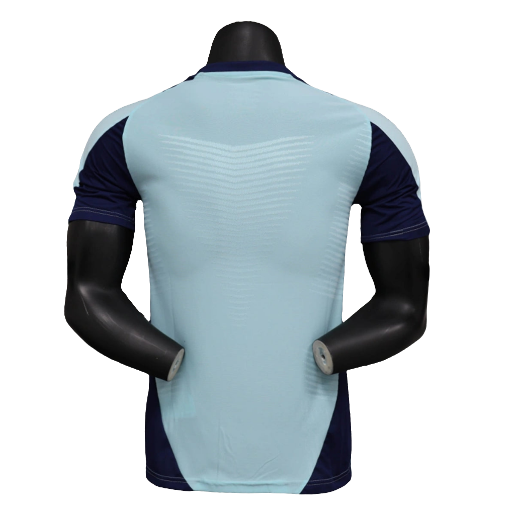 Camisa Arsenal 24/25 Pré-Jogo - Azul Claro - Versão Jogador